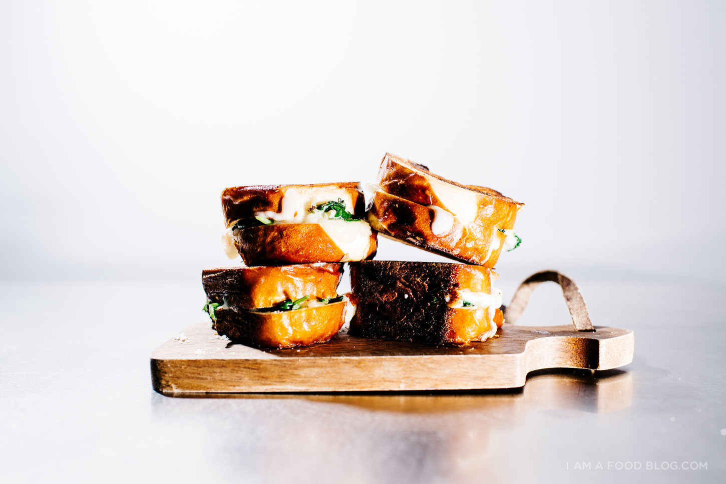 spinach and mozza grilled cheese on pretzel bread - www.iamafoodblog.com