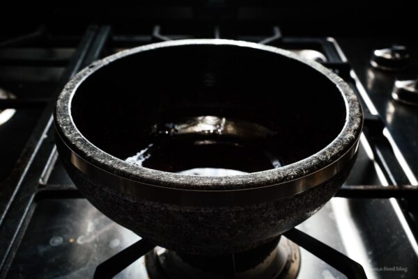 heating up stone bowl for bibimbap | www.iamafoodblog.com