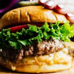 Make the ultimate burger: the juicy lucy. Juicy beef patty stuffed with melty gooey cheese. #burger #recipe #easy #dinner