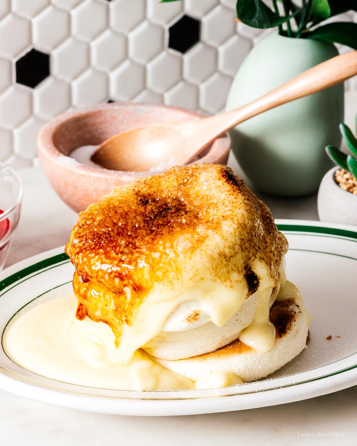 Do you want to eat fluffy Japanese soufflé creme brûlée pancakes but don’t want to fly to Hong Kong or wait in a line for hours? This recipe is for you! Make the fluffy pancakes of your dreams, tall and fluffy with a creme brûlée crackling sugar crust. #pancakes #japanesepancakes #soufflepancakes #recipes #brunch