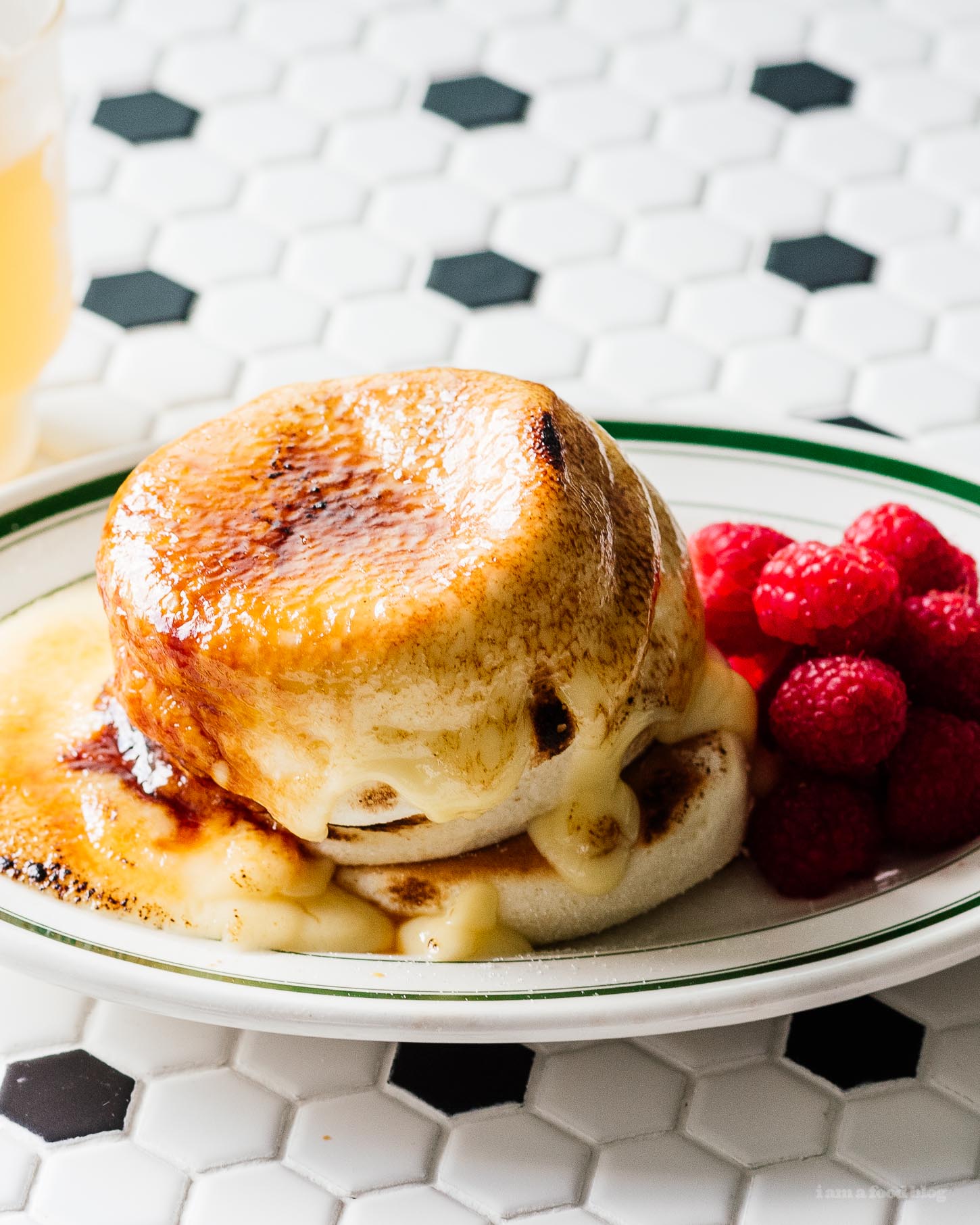Do you want to eat fluffy Japanese soufflé creme brûlée pancakes but don’t want to fly to Hong Kong or wait in a line for hours? This recipe is for you! Make the fluffy pancakes of your dreams, tall and fluffy with a creme brûlée crackling sugar crust. #pancakes #japanesepancakes #soufflepancakes #recipes #brunch