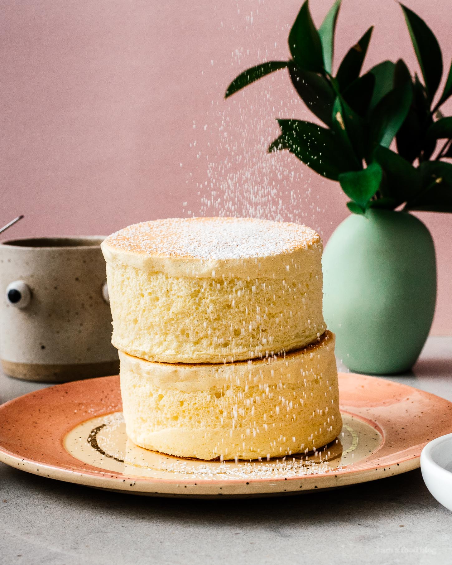 Skip the flight to Japan and make Gram Pancake extra tall fluffy Japanese soufflé pancakes right at home. #soufflepancake #pancakes #japanese #recipe #grampancakes