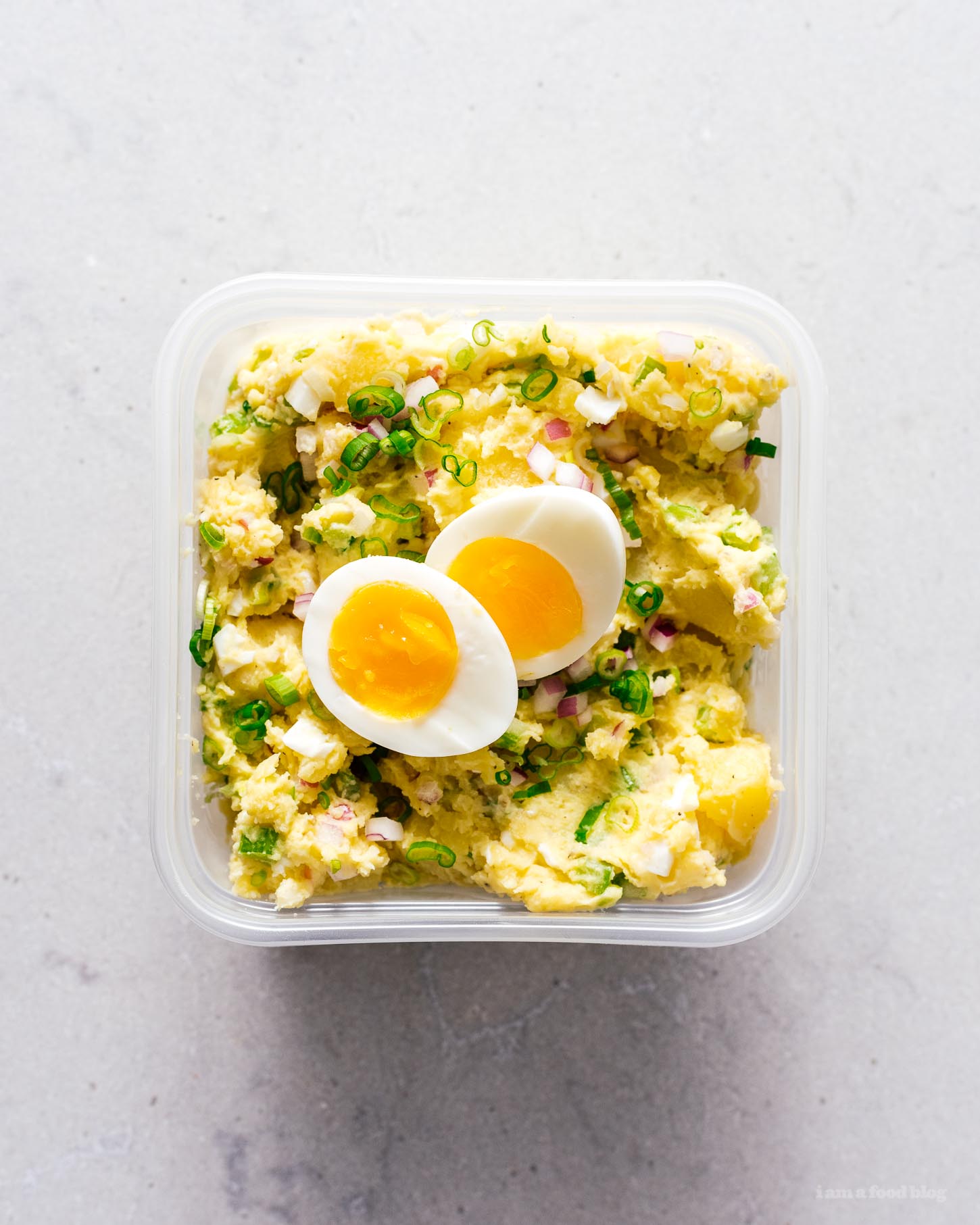 Make this classic perfect picnic potato salad and bring it to ever summer gathering! Creamy potatoes, crunchy celery, onions, and eggs combine into a salad you’ll be making and eating over and over again thanks to a secret ingredient: rice vinegar for tang. #potatosalad #potatoes #recipes #potatosaladrecipe