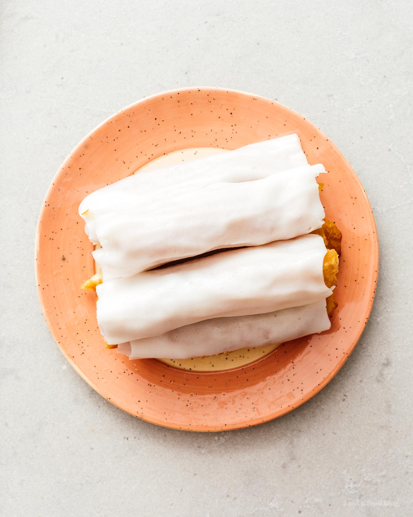 Zhaliang is super popular dish at Cantonese style dim sum made cheung fun (rice noodle sheets) wrapped around crispy youtiao (Chinese fried dough). It’s insanely tasty and easier than you think to make at home! #chinesefood #recipe #dimsum #zhaliang
