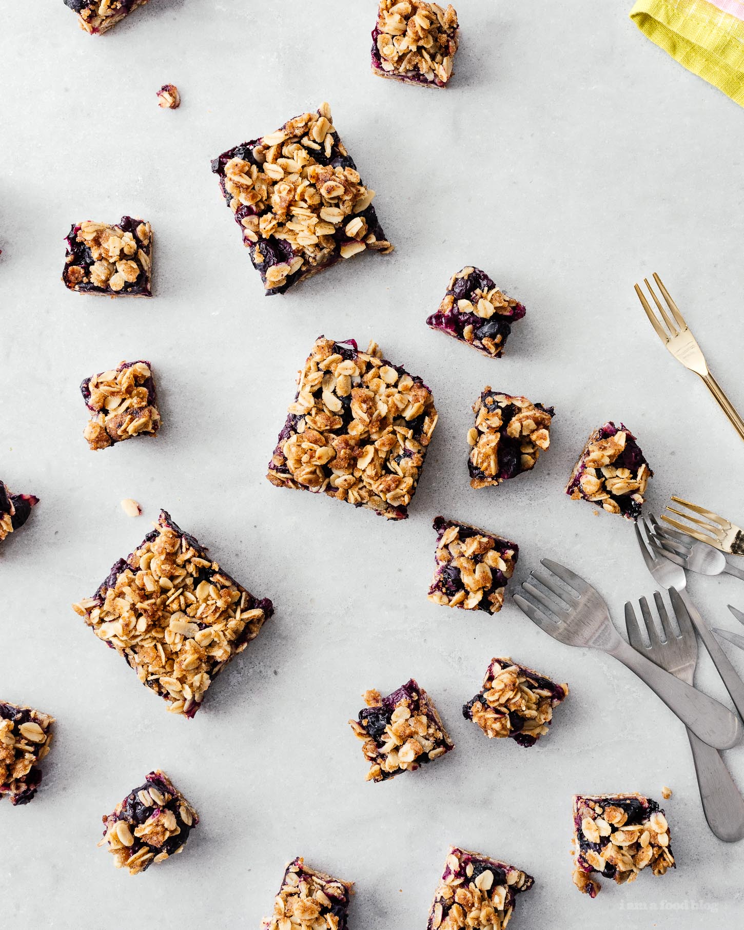 These browned butter blueberry oatmeal crumble bars are bursting with all the goodness of sweet summertime blueberries, nutty browned butter, and heart healthy oats. Make a batch today! #brownedbutter #brownbutter #recipes #dessert #oatbars #blueberrybars #blueberries #oatmeal