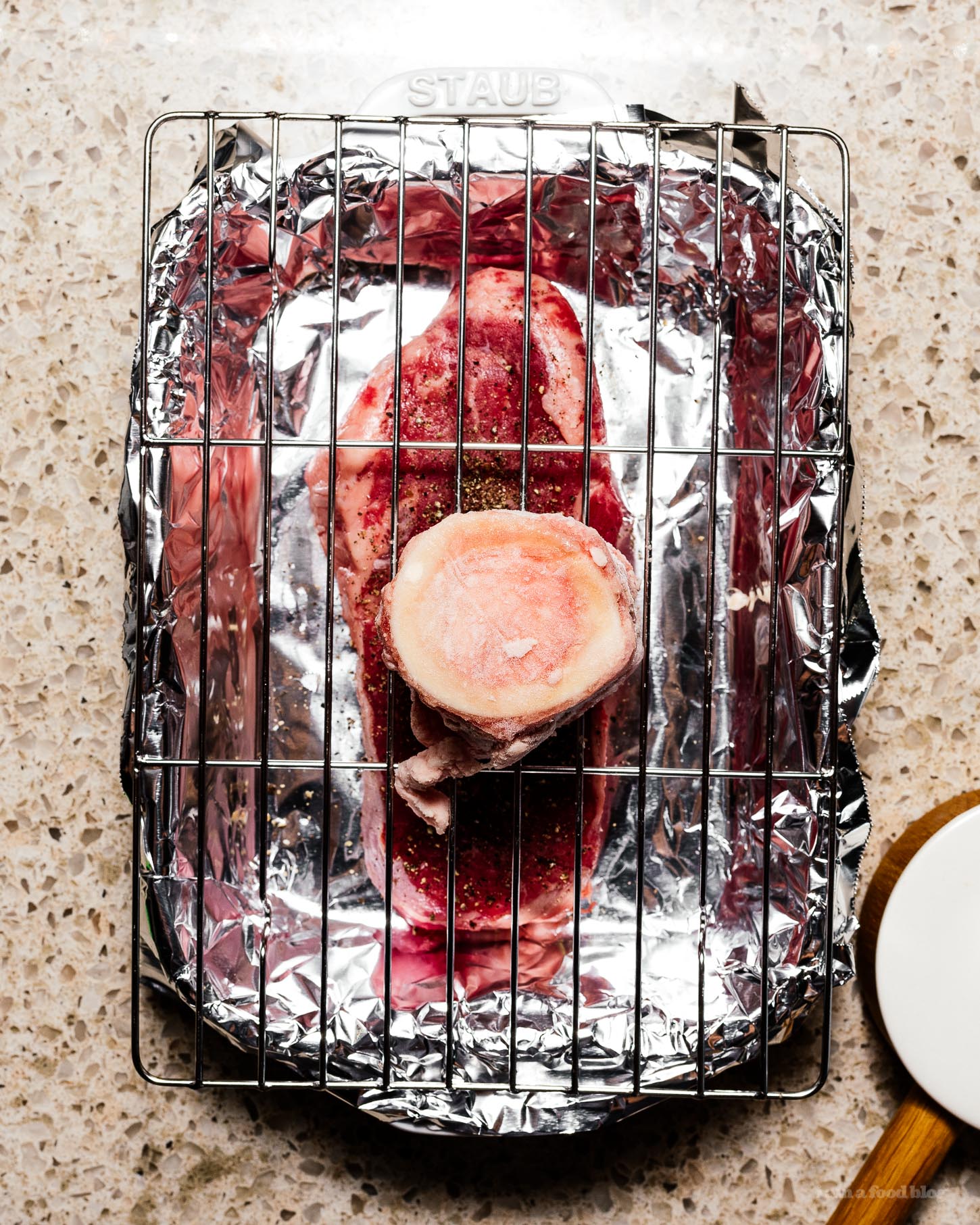 Oven roasted steak with Japanese chimichurri, roasted bone marrow, and jammy eggs