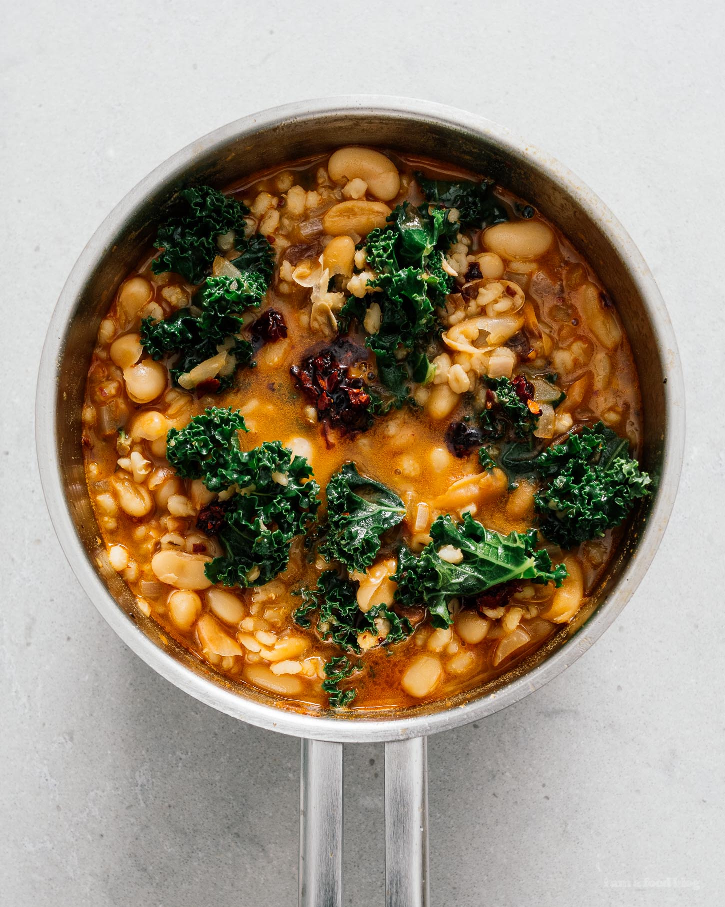 Spicy Chili Crisp White Bean and Barley Stew with Kale and Eggs | www.iamafoodblog.com