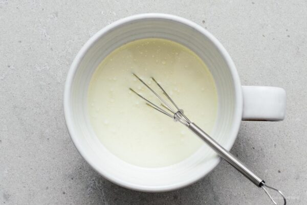 milk, oil, and vanilla whisked together for oreo mug cake | www.iamafoodblog.com