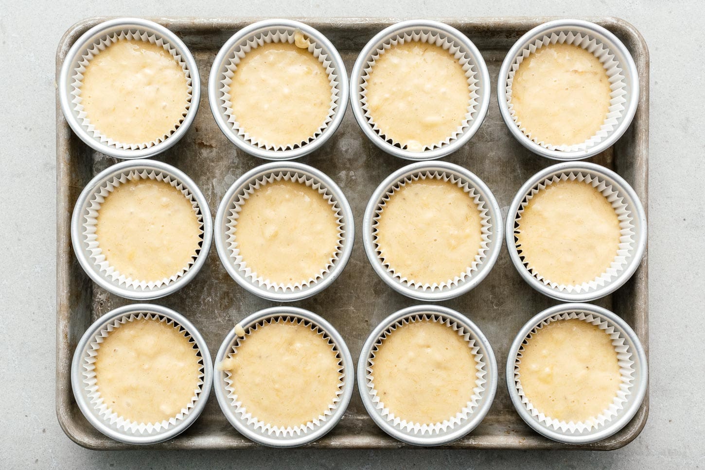 muffin batter in muffin tins | www.iamafoodblog.com