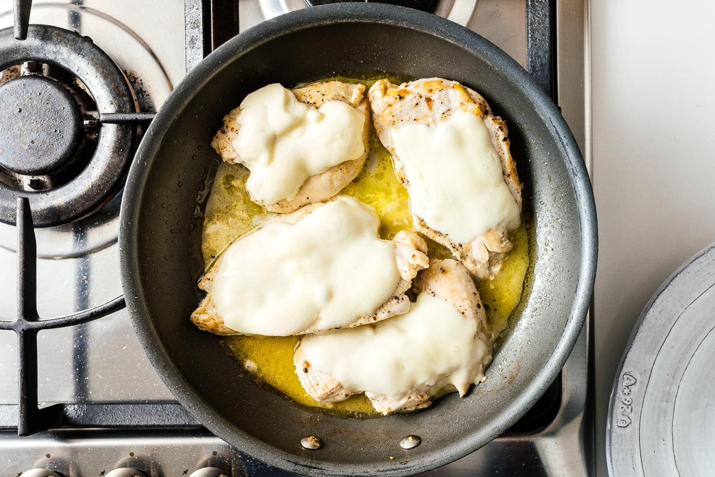melting cheese on chicken |  www.iamafoodblog.com
